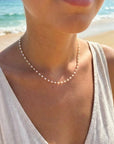 Chaîne de dos perles d’or