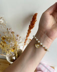 Bracelet perlé avec charm coquillage