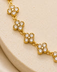 Collier doré avec fleurs argentés 100% inoxydable